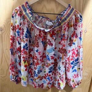 Tanya Taylor silk floral print blouse with a smocked neckline